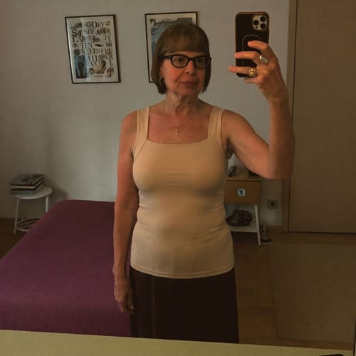 Ayah customer wearing the beige Restore Bra Tank